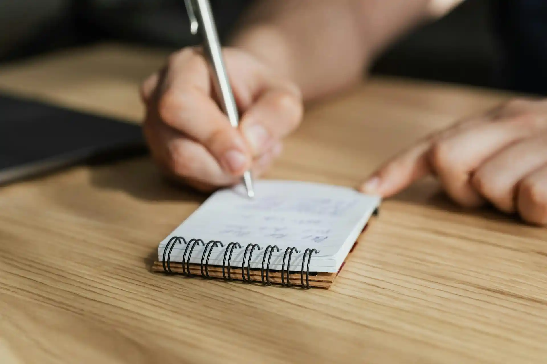 A student writing down his grades